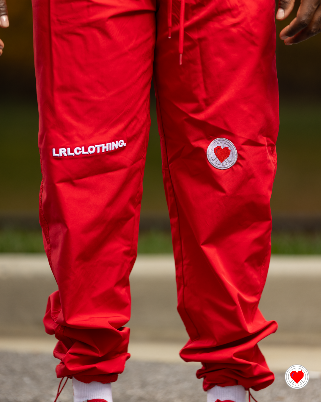 “Unisex Red Swish Swish 2.0 Pants”