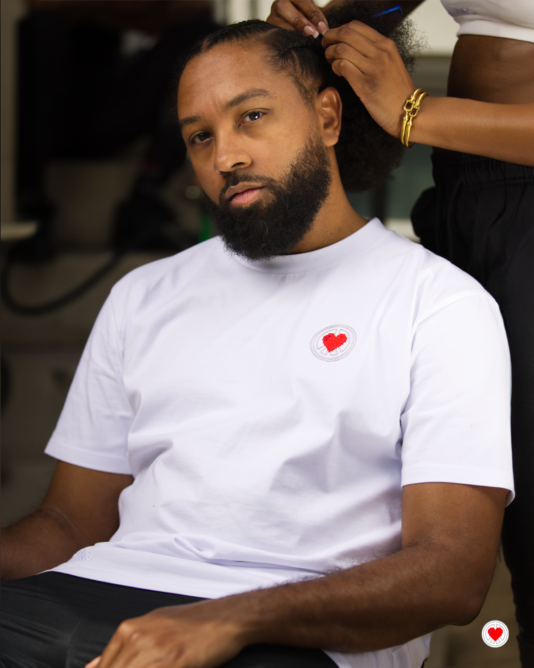“Unisex White Stitched Heart Logo Tee”