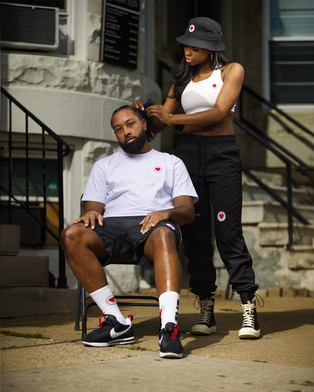 “Unisex White Stitched Heart Logo Tee”