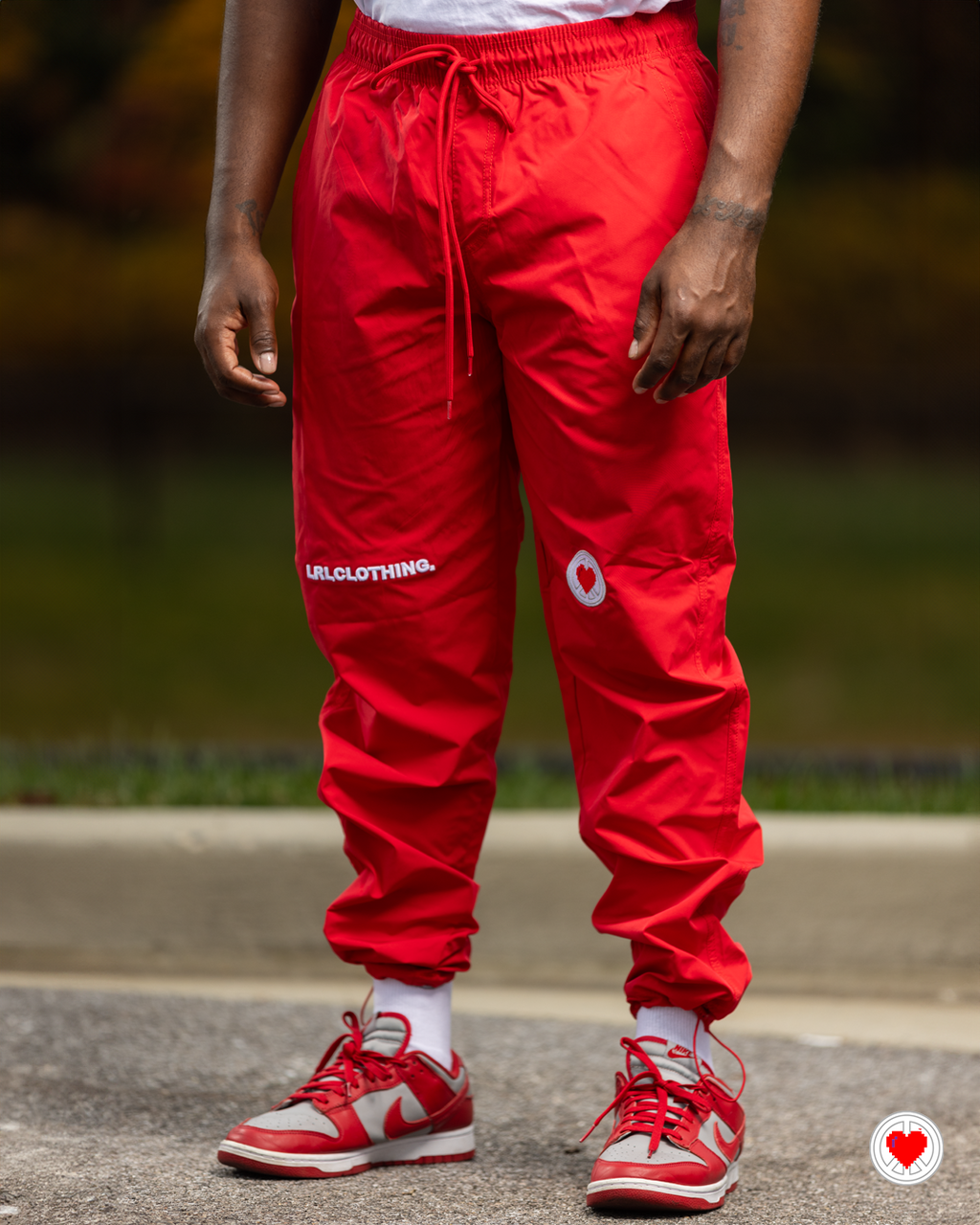 “Unisex Red Swish Swish 2.0 Pants”