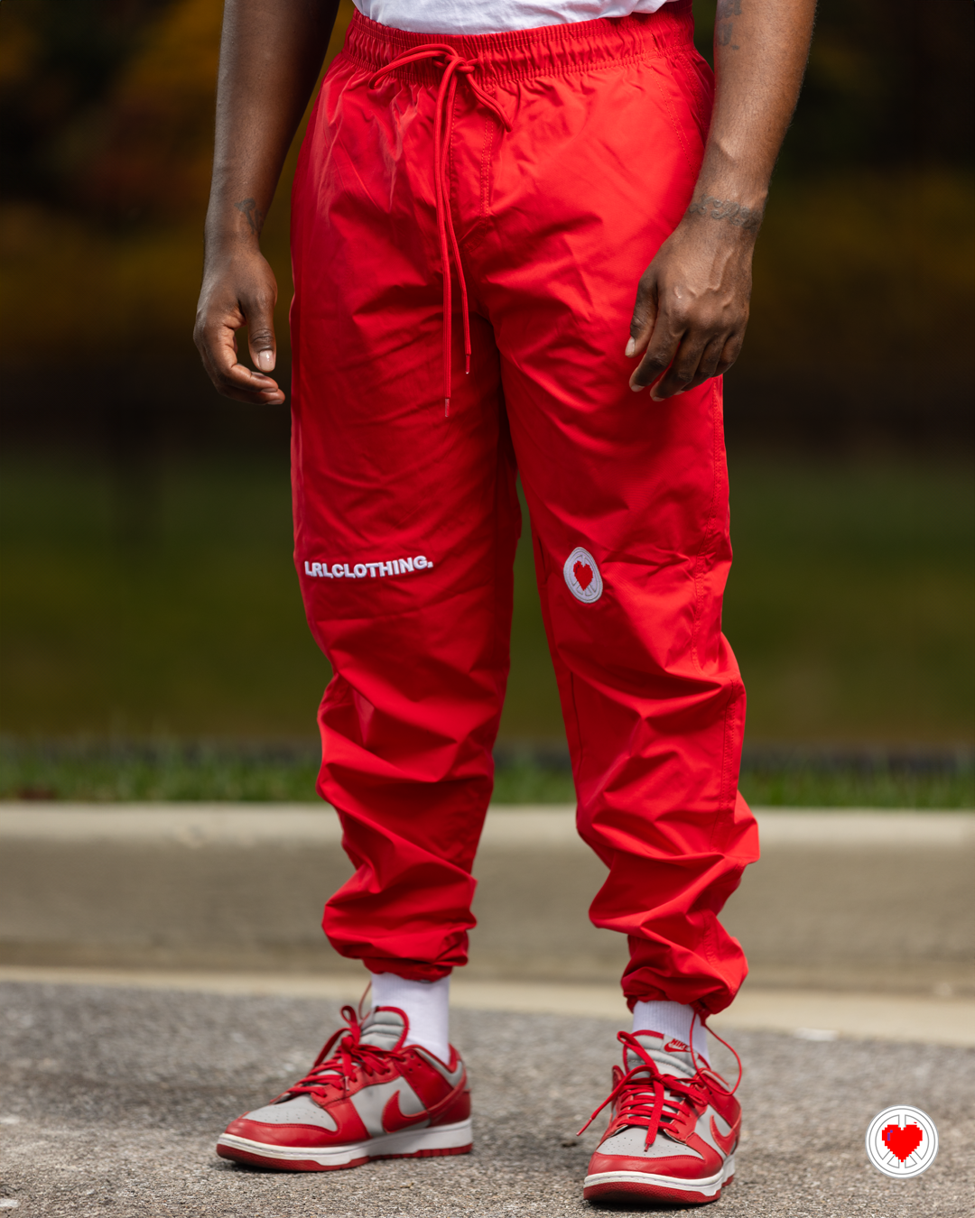 “Unisex Red Swish Swish 2.0 Pants”