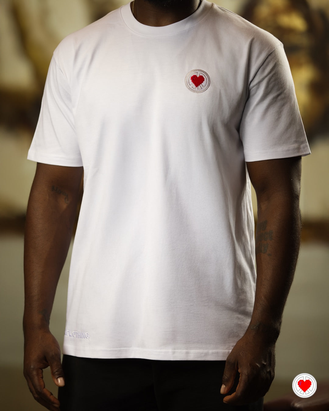 “Unisex White Stitched Heart Logo Tee”