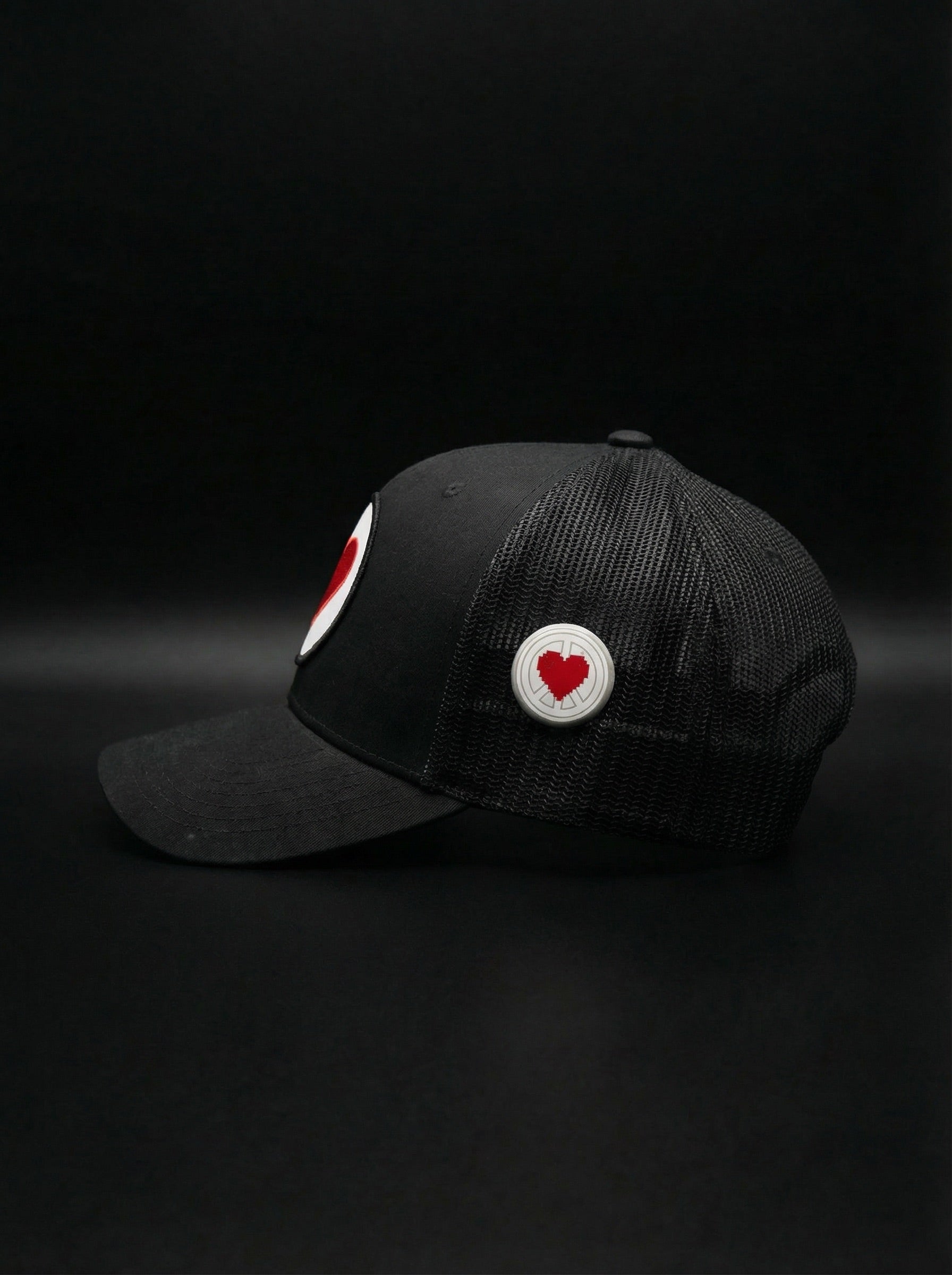 "Unisex Black Heart Logo Trucker"