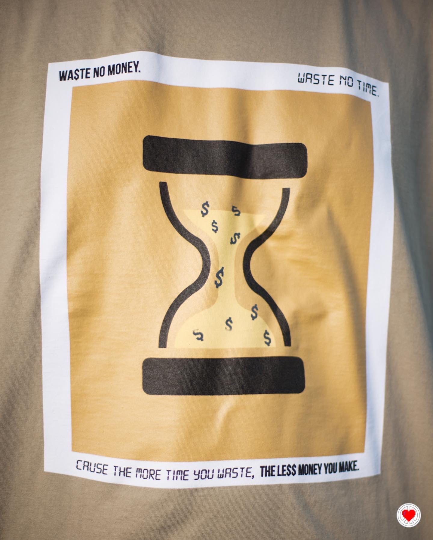 “Unisex Tan Hour Glass Tee”