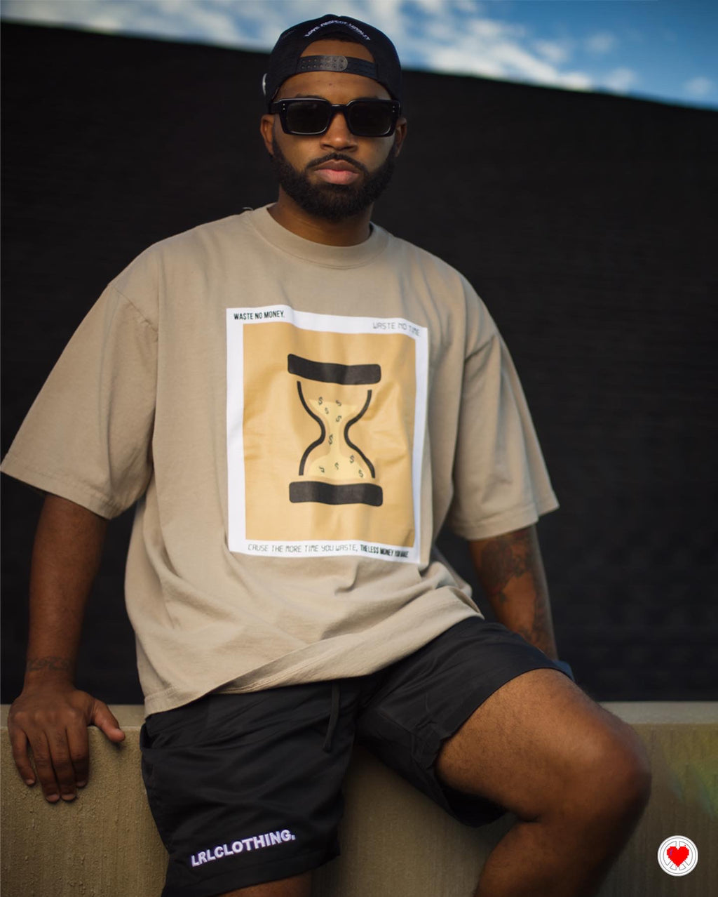 “Unisex Tan Hour Glass Tee”